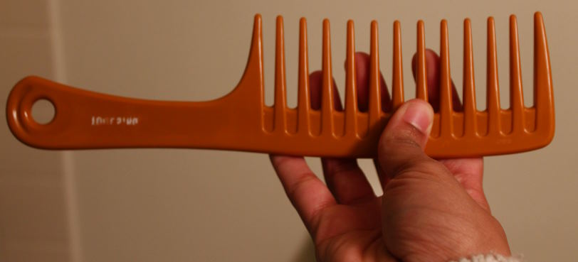 use a wide-tooth comb effectively